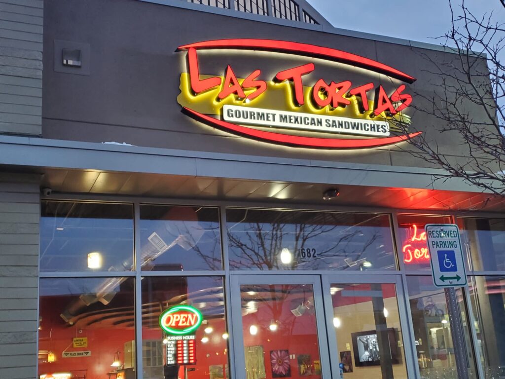 Illuminated LED storefront sign for a Mexican sandwich restaurant, designed and installed by ASD Printing in Aurora Colorado